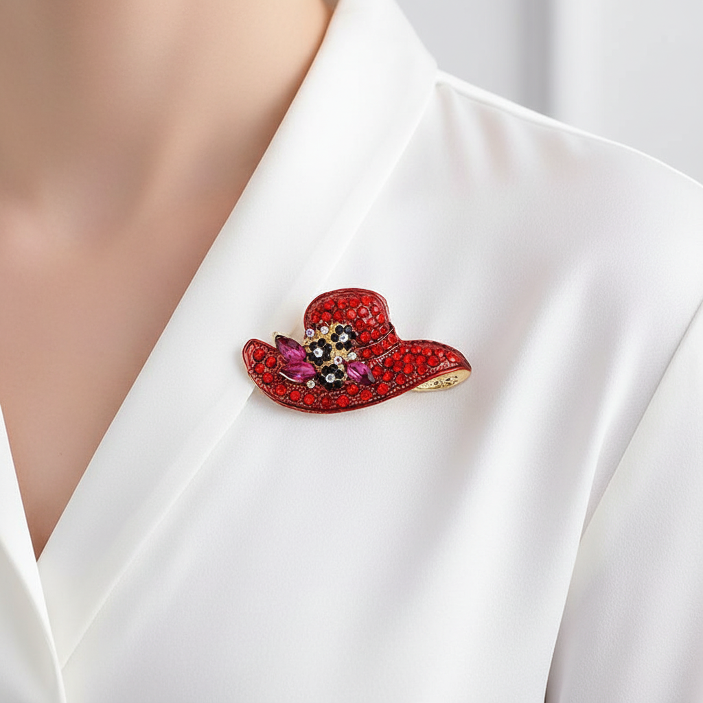 Red Hat Brooch on White Blouse